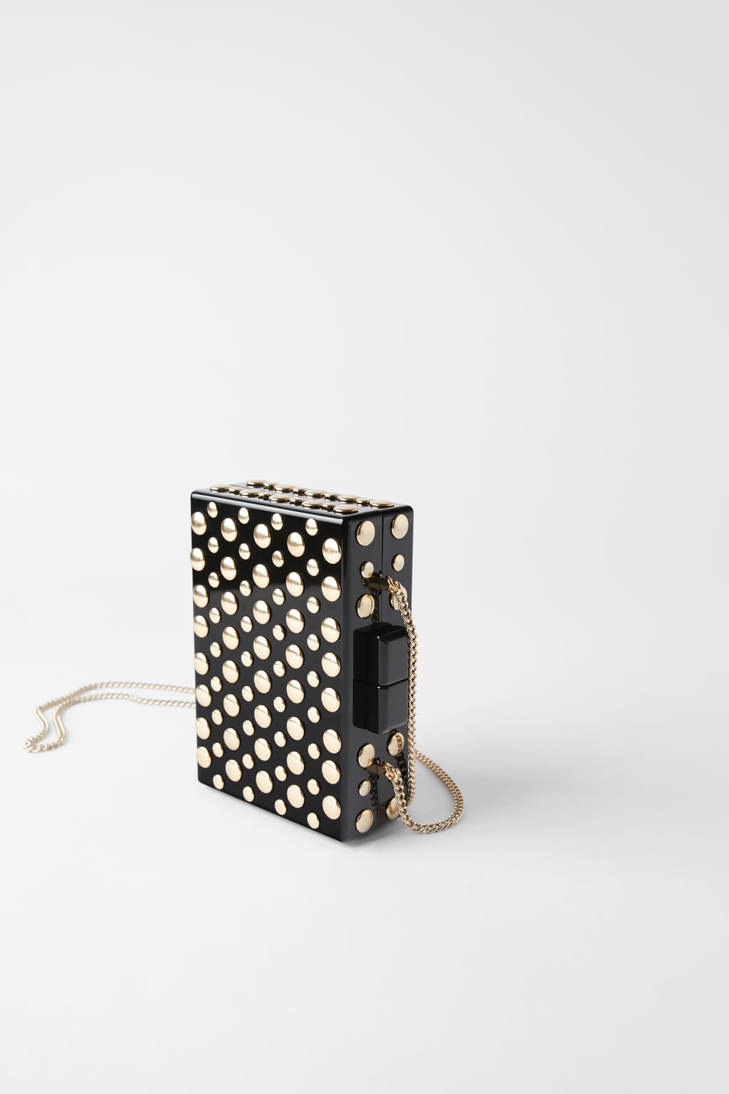 Bolso de mano con tachas