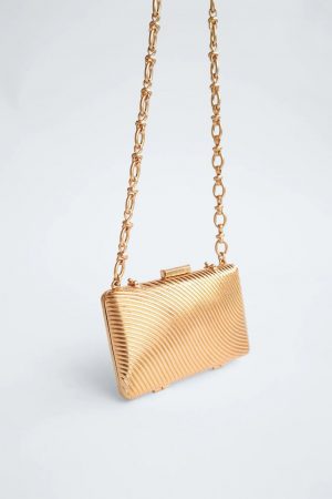 bolso caja metálita