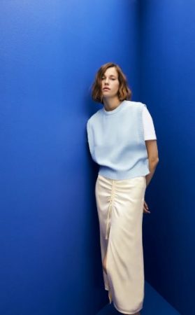 Chaleco punto botones laterales