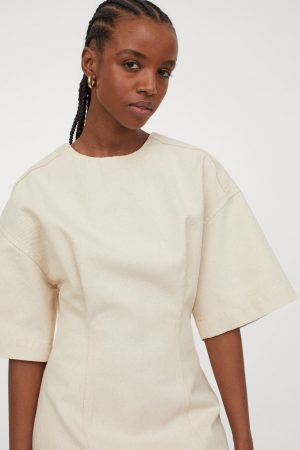 Vestido en denim de algodón por H&M