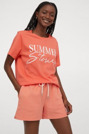 Camiseta naranja con motivo estampado