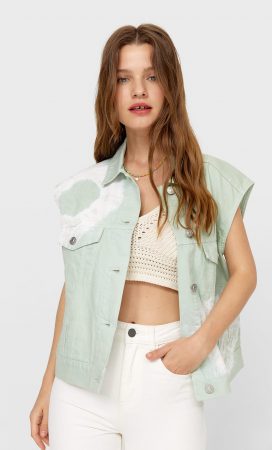 Chaleco denim acid wash