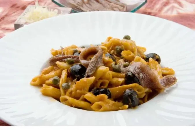 Séptimo paso: emplatar y espolvorear el queso