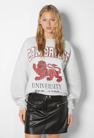 Minifalda efecto piel con bolsillos