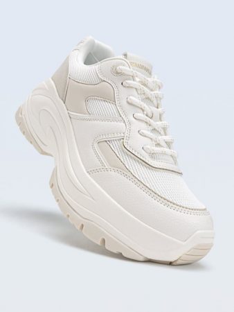 Zapatillas con detalle de piezas