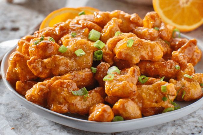 Ternera o pollo a la naranja