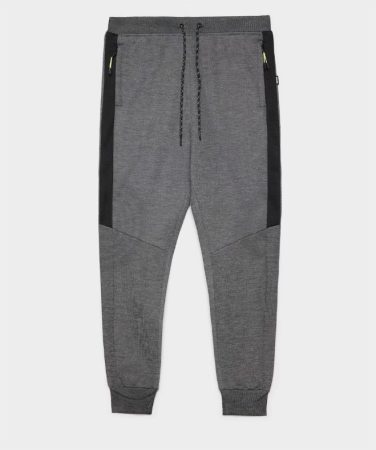 Inside, Sfera y más: renueva tu armario con los pantalones por menos de 25 euros de El Corte Inglés 98 Merca2.es Jogger de hombre regular en color gris Merca2.es