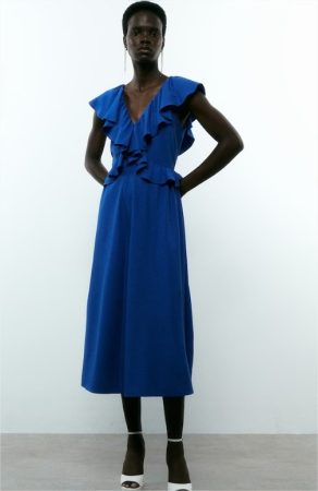 No ocupa espacio y sienta de maravilla: El Corte Inglés tiene el vestido midi satinado que no puede faltar en tu maleta de vacaciones 43 Merca2.es vestido volantes sfera