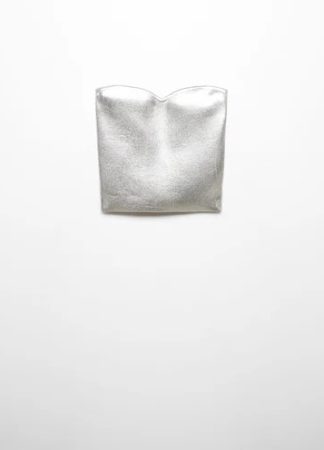 Descubre la alternativa estilosa: tops para brilla en cada fiesta navideña