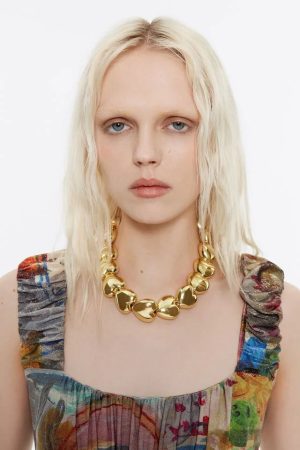 COLLAR CORAZONES DORADO