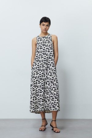 Sfera arrasa con esta colección de vestidos holgados perfectos para disimular barriguita 62 Merca2.es VESTIDO ESTAMPADO VUELO