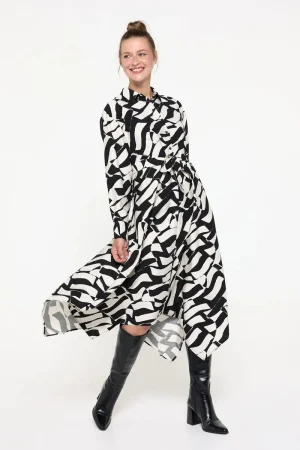 Vestido midi camisero y bajo asimétrico