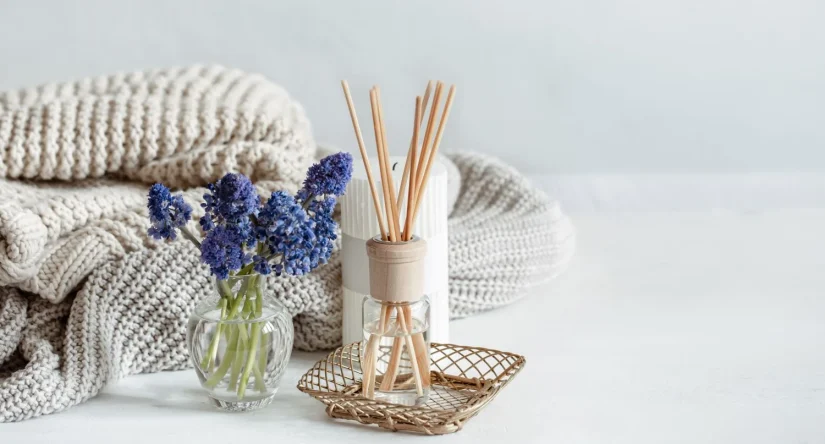 spring home composition with flowers aroma sticks knitted element copy space Merca2.es