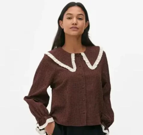 1. Blusa de marrón chocolate con cuello bebé, diseño Primark