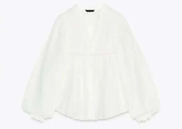 7.- Cuerpo de algodón con bordados