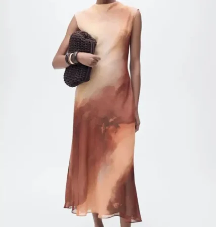 Gracias a Mango y sus vestidos satinados te convertirás en el centro de las fiestas 69 Merca2.es 3. Vestido satinado degradado: un toque de arte y elegancia