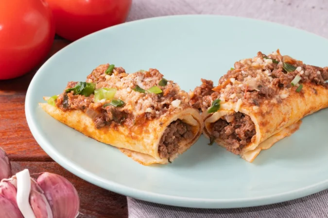 meat pancake covered with tomato sauce parmesan cheese Merca2.es