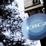 Cartel de Digi en una de sus tiendas. Fuente: Agencias