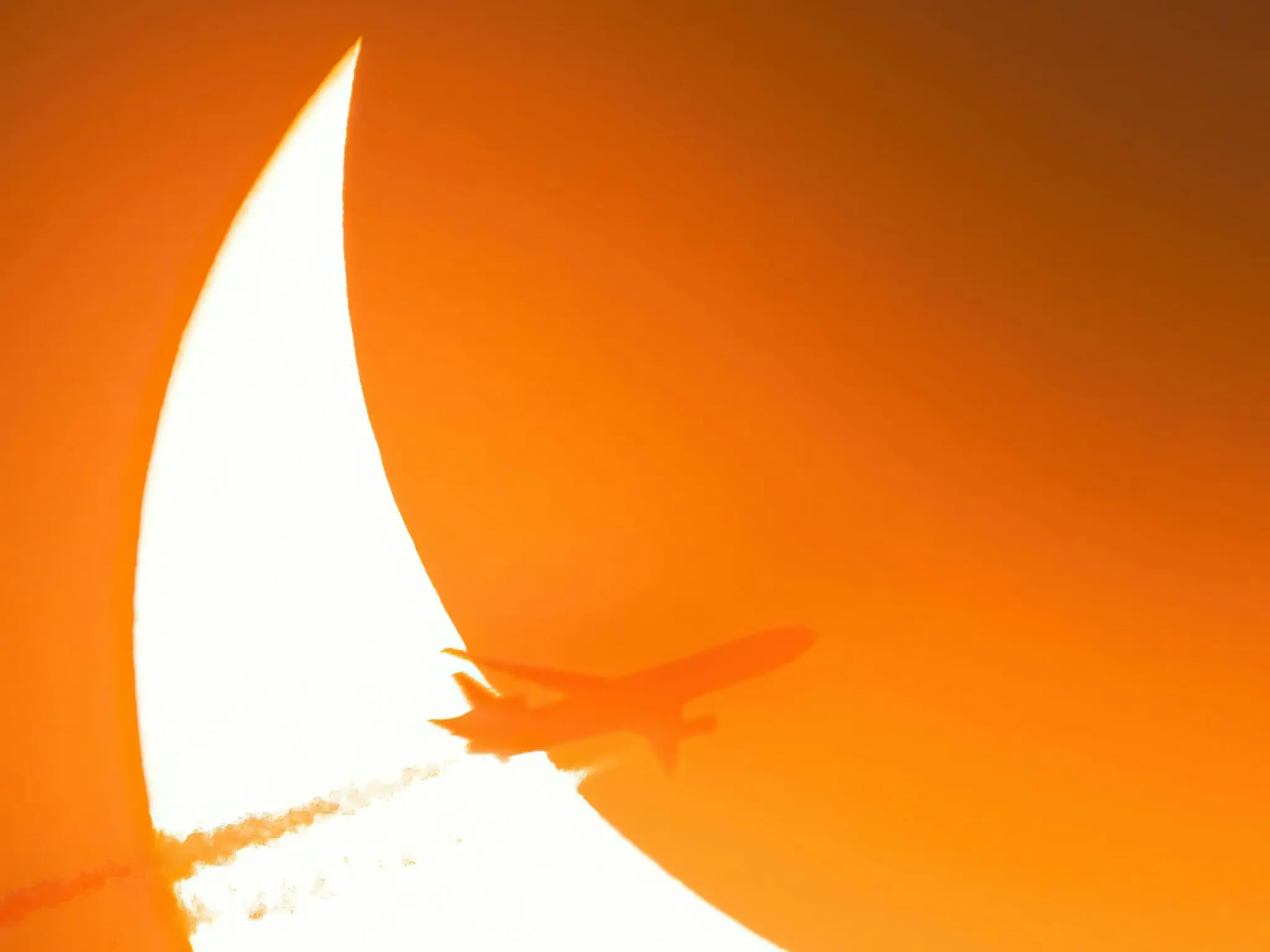 avión NASA eclipse sombra