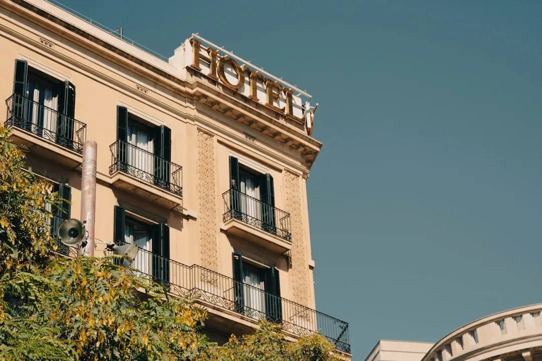 a hotel sign on top of a building