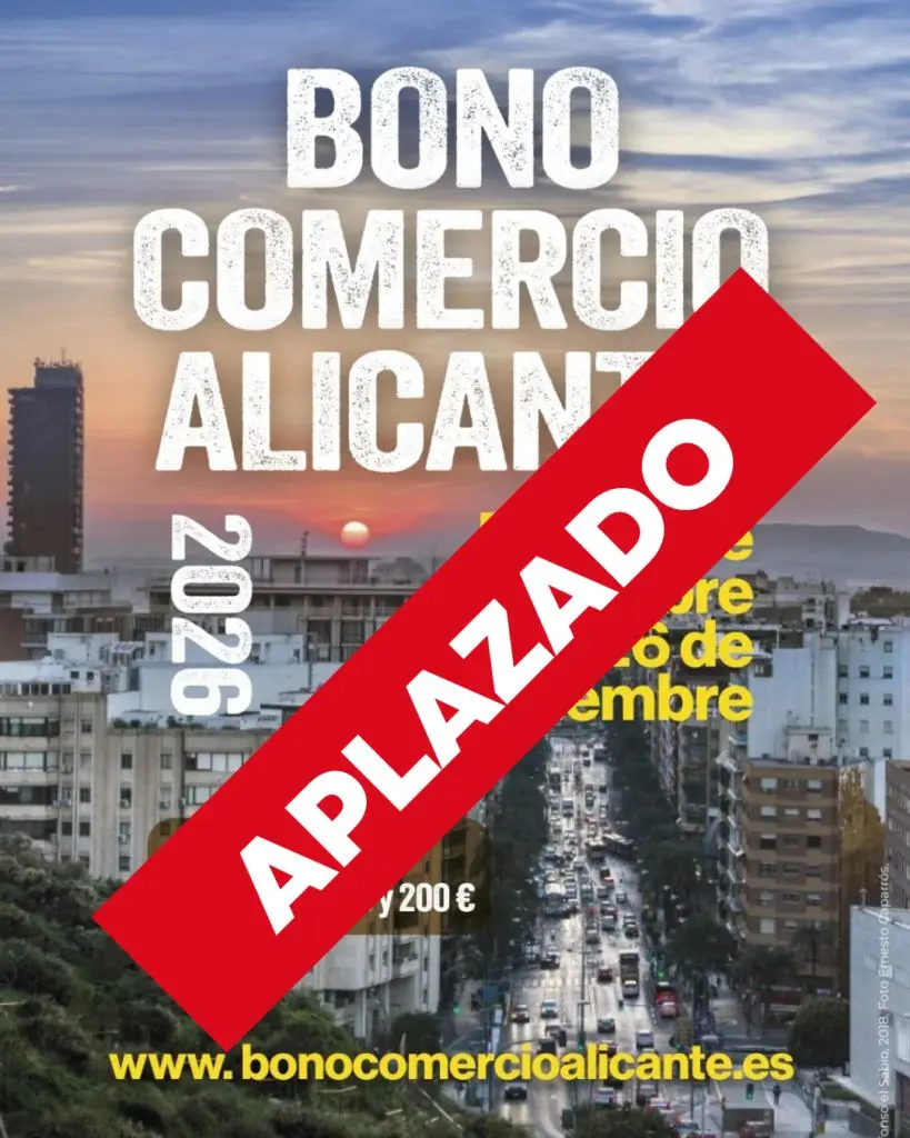 Cartel del Bono Comercio aplazado Cartel del Bono Comercio Alicante 2026 con una banda roja que indica aplazado.