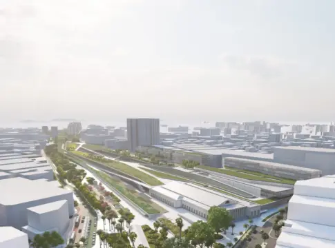 Render del Parque Central de Alicante Vista aérea ilustrada de un entorno ferroviario con zonas verdes, paseos y edificios